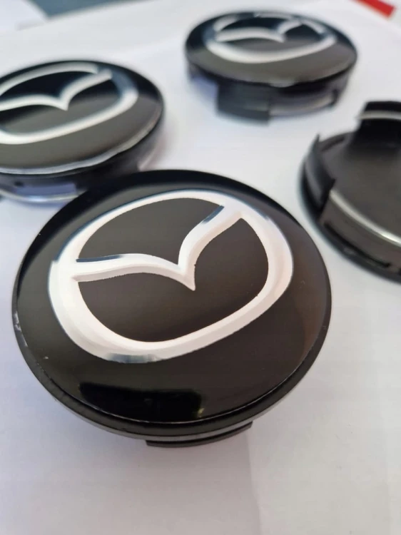 MAZDA DEKIELKI KAPSLE DEKLE ZNACZKI DO ALUFELG 59mm/55mm 4szt