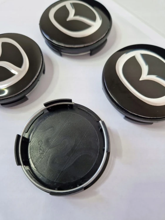 MAZDA DEKIELKI KAPSLE DEKLE ZNACZKI DO ALUFELG 59mm/55mm 4szt