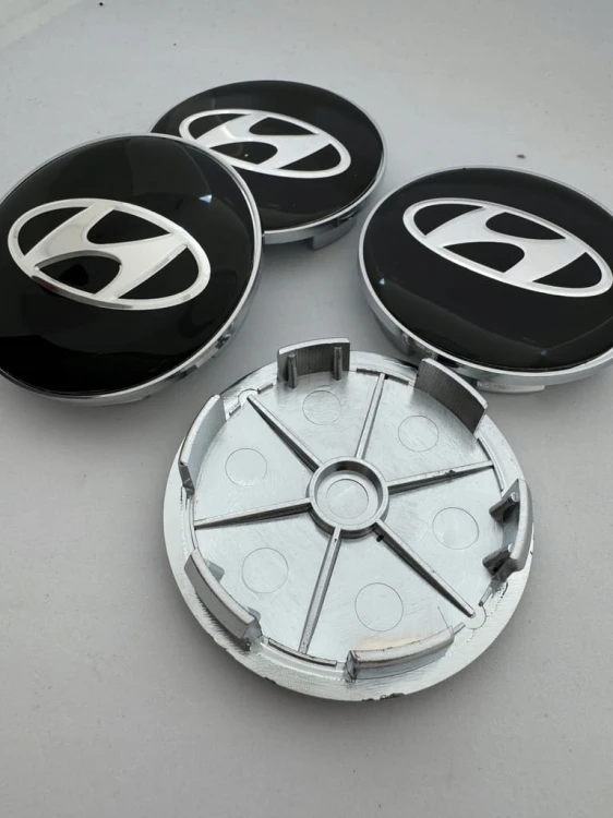 HYUNDAI DEKIELKI KAPSLE DEKLE ZNACZKI LOGO DO ALUFELG 68mm/62mm 4szt.