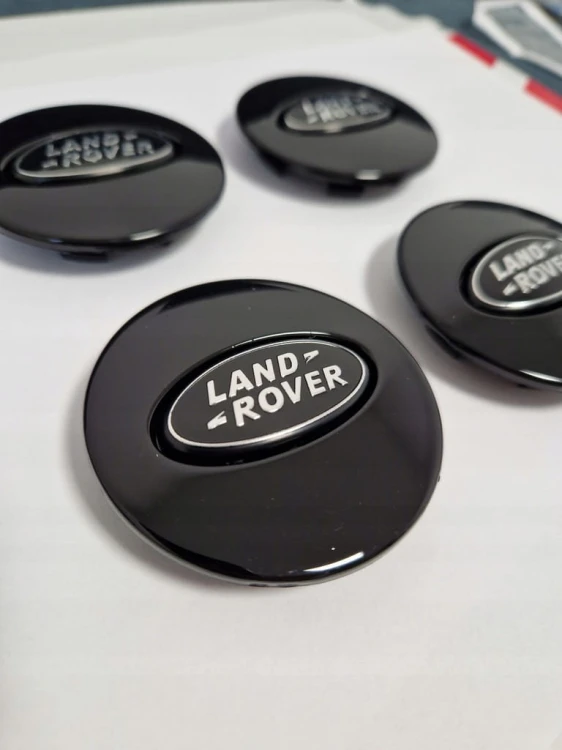 LAND ROVER DEKIELKI KAPSLE DEKLE ZNACZKI 62mm/47mm 4szt.
