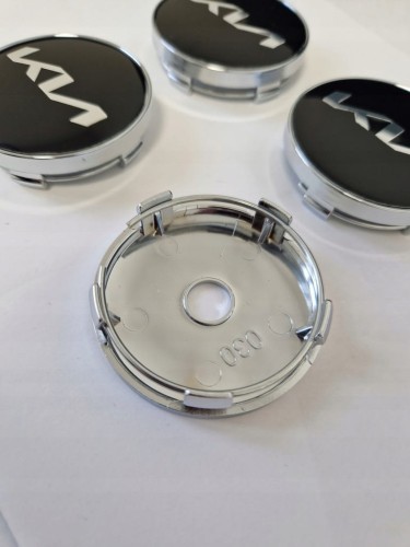 KIA DEKIELKI KAPSLE DEKLE ZNACZKI DO ALUFELG 60mm/56mm 4szt.