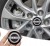 NISSAN NAKLEJKI 56mm EMBLEMATY ZNACZKI ALUMINIOWE 4szt.